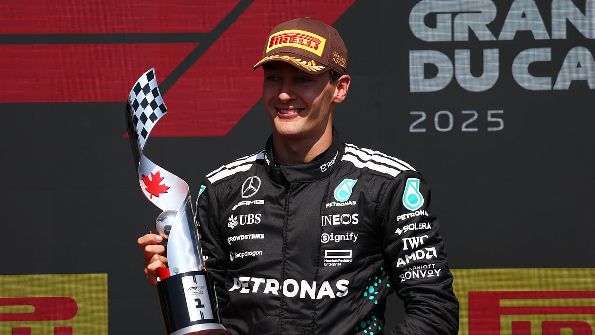 George Russell celebrates his victory in Montreal. - null