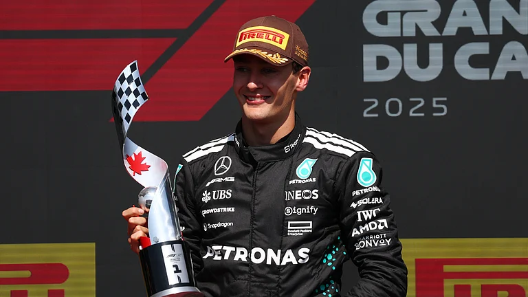 George Russell celebrates his victory in Montreal. - null