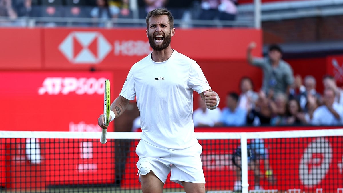Corentin Moutet celebrates his win at Queen's