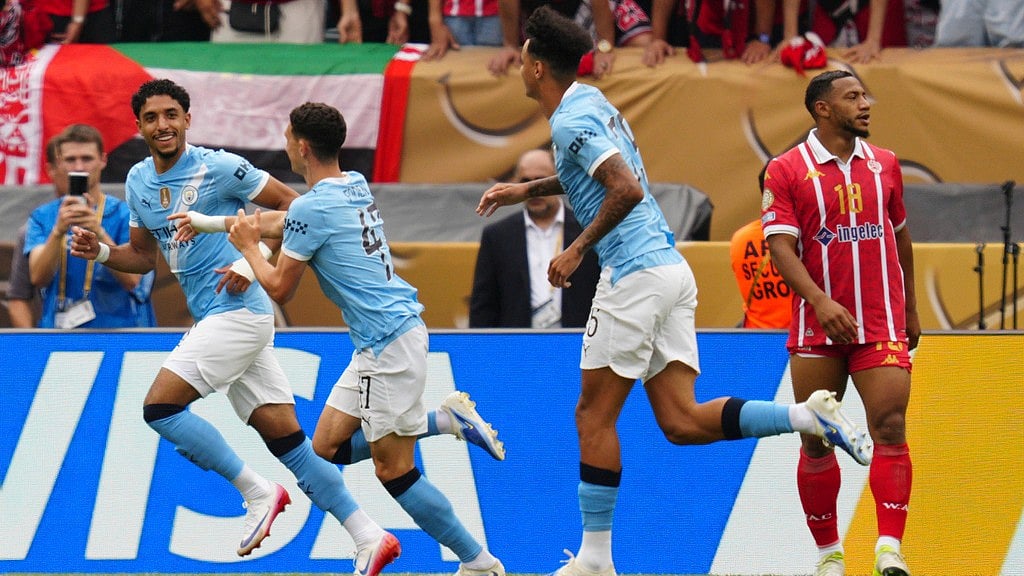 Photo: AP : Manchester City players celebrate their opening goal by Phil Foden, centre, during the FIFA Club World Cup group G match against Wydad AC in Philadelphia.