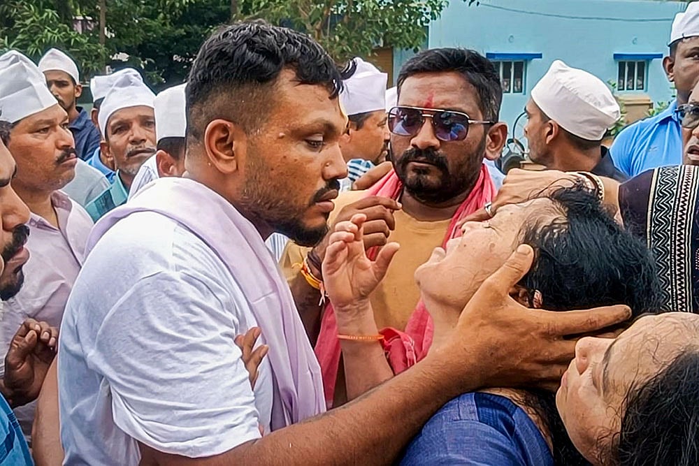 AI plane crash Lone survivor attends brothers cremation