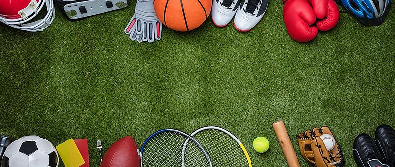 Sports equipment in green grass