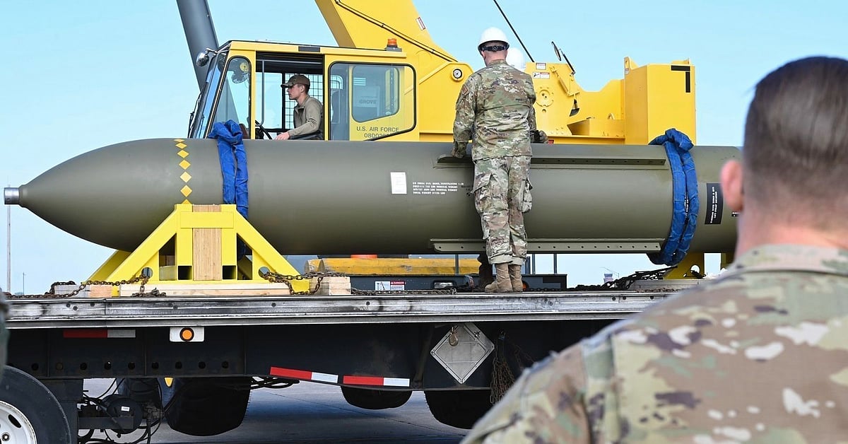 AP : In this photo released by the U.S. Air Force on May 2, 2023, airmen look at a GBU-57, or the Massive Ordnance Penetrator bomb, at Whiteman Air Base in Missouri.(U.S. Air Force via AP, File)