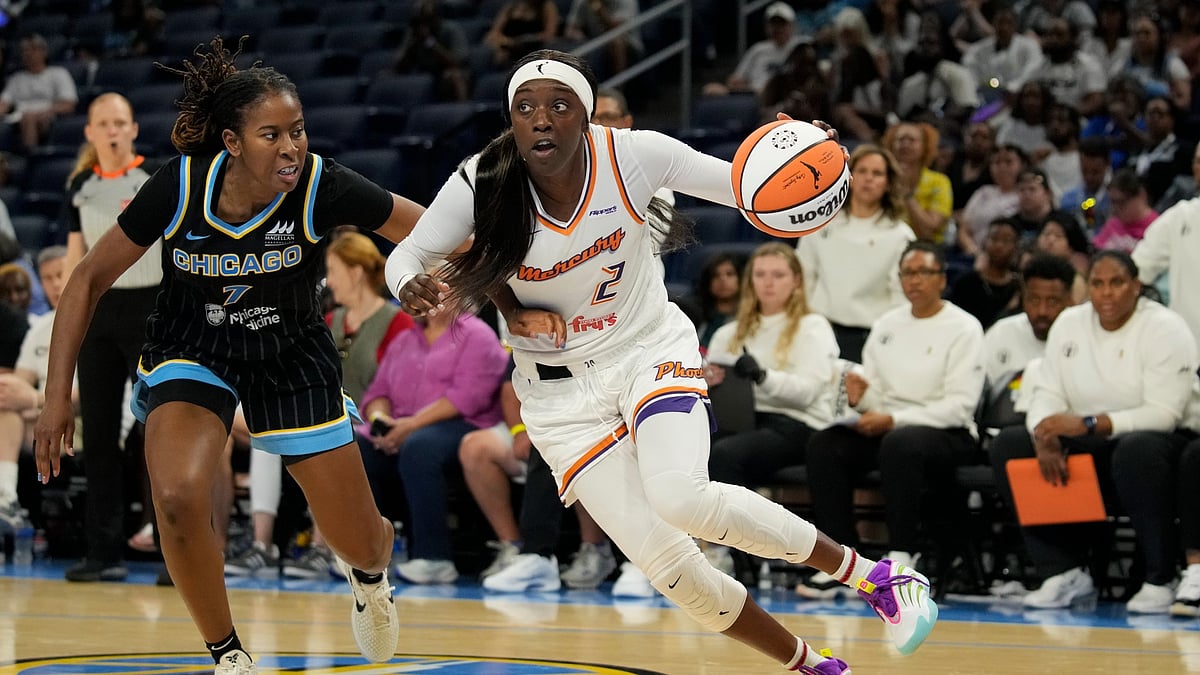Kahleah Copper #2 of the Phoenix Mercury dribbles the ball against Ariel Atkins #7 of the Chicago Sky during the third quarter at Wintrust Arena on June 21, 2025 in Chicago, Illinois.