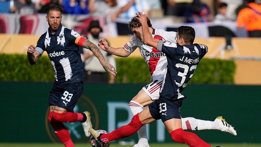 AP : River Plate's Facundo Colidio, center, Monterrey's Sergio Ramos, left, and Stefan Medina battle for the ball during the Club World Cup Group E soccer match.