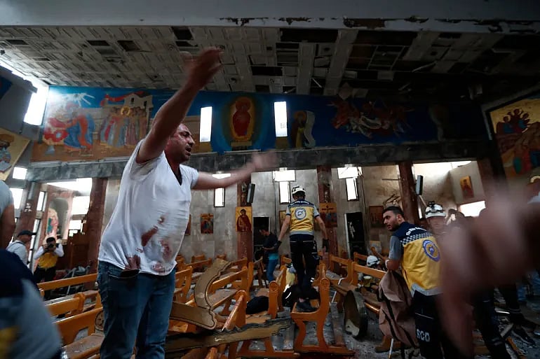 Omar Sanadiki/AP : Mar Elias Church after the attack 