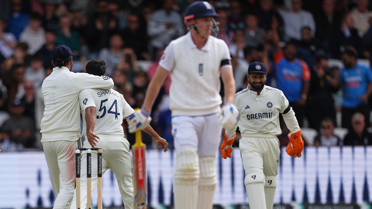 (AP Photo/Scott Heppell)


 : IND Vs ENG 1st Test Day 5: Shardul Thakur Takes Two Wickets In Two Balls: India's Shardul Thakur (54) celebrates with teammates after the dismissal of England's Harry Brook, front, on day five of the first cricket test match between England and India at Headingley in Leeds, England, Tuesday, June 24, 2025. 