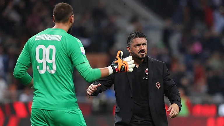 Gianluigi Donnarumma with Gennaro Gattuso - null