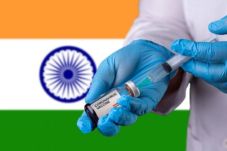 Healthcare worker filling vaccine with medication