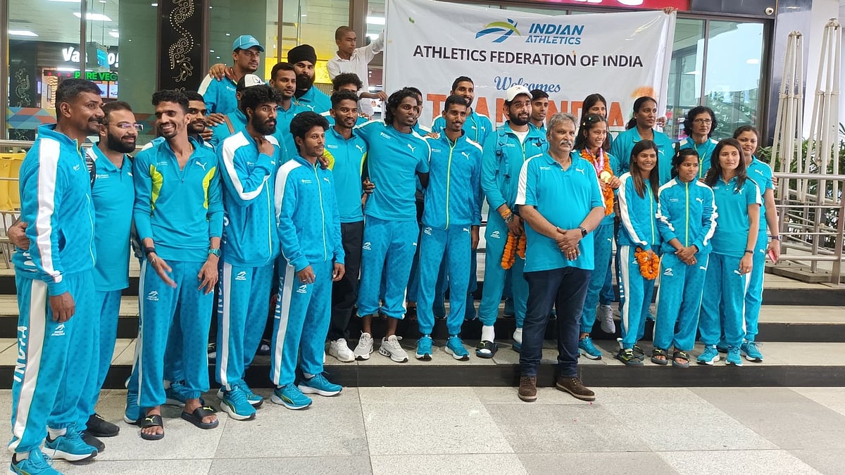 Photo: X | Athletics Federation of India : Indian athletics contingent at the Delhi International Airport.