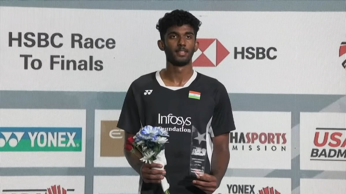 X : Ayush Shetty on the winner's podium at the US Open Super 300.