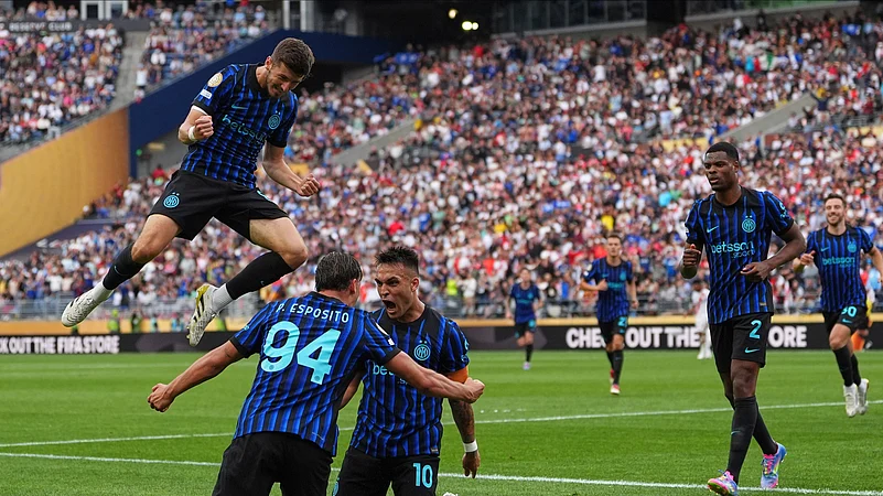 Inter Milans Francesco Pio Esposito celebrates with teammates. AP
