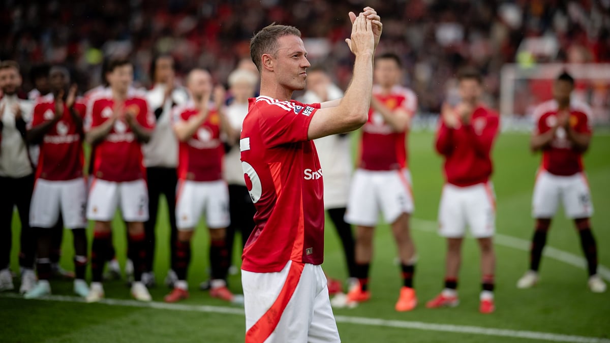 Jonny Evans has hung up his boots. - null