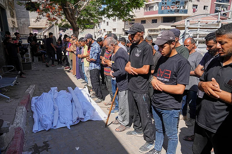 Gaza Aid seekers killed by IDF_funeral outside Shifa hospital
