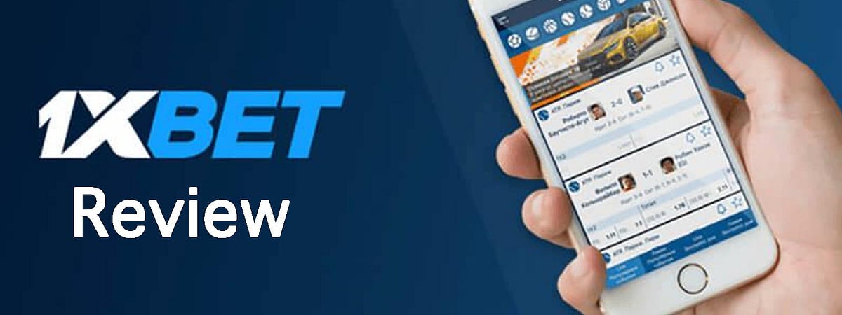 1xBET review with phone in hand