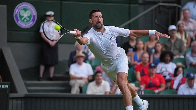 Novak Djokovic of Serbia returns to Alexandre Muller of France. AP