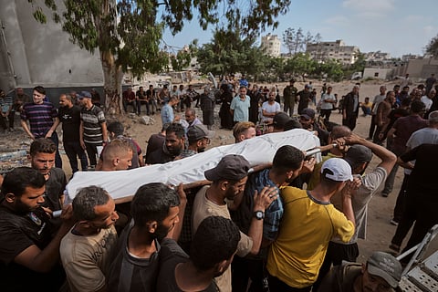A Palestinian wounded while returning from one of the Gaza Humanitarian Foundation distribution centers operated by the U.S.-backed organization, according to Nasser Hospital, are treated in Khan Younis, Monday, June 30, 2025.