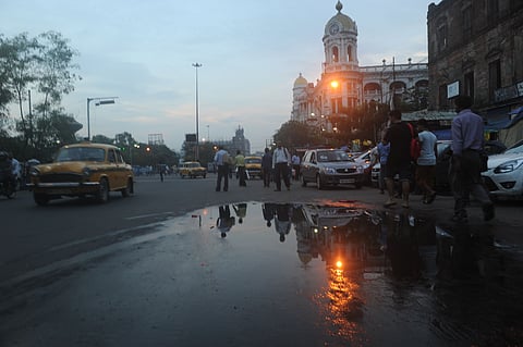 A yellow taxi at Kolkata's famous Chowringhee Road.