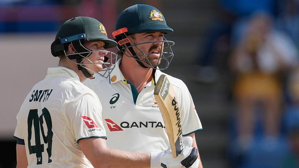 AP : Australia's Steve Smith acknowledges scoring a half-century against West Indies during his partnership with Travis Head on day three of the second Test match at the National Cricket Stadium in St. George's, Grenada.