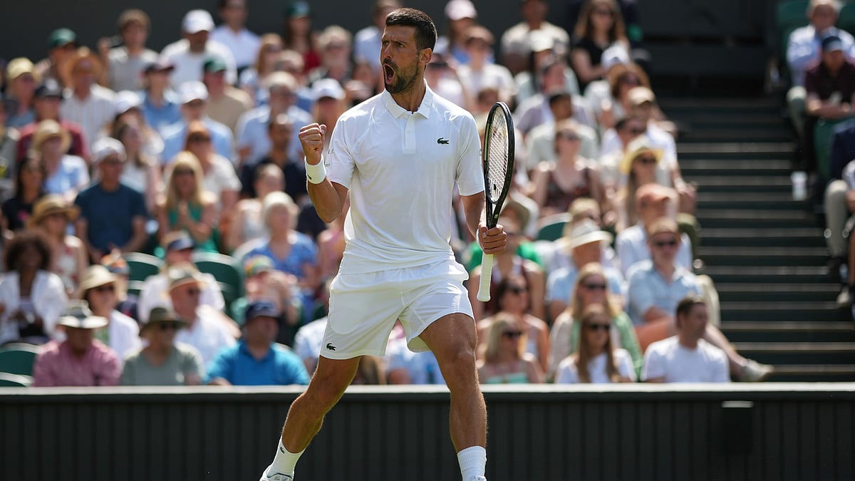| Photo: AP/Alastair Grant : Wimbledon 2025 Day 6: Novak Djokovic of Serbia reacts after winning a point against Daniel Evans of Britain during their second round men's singles match at the Wimbledon Tennis Championships in London, Thursday, July 3, 2025.