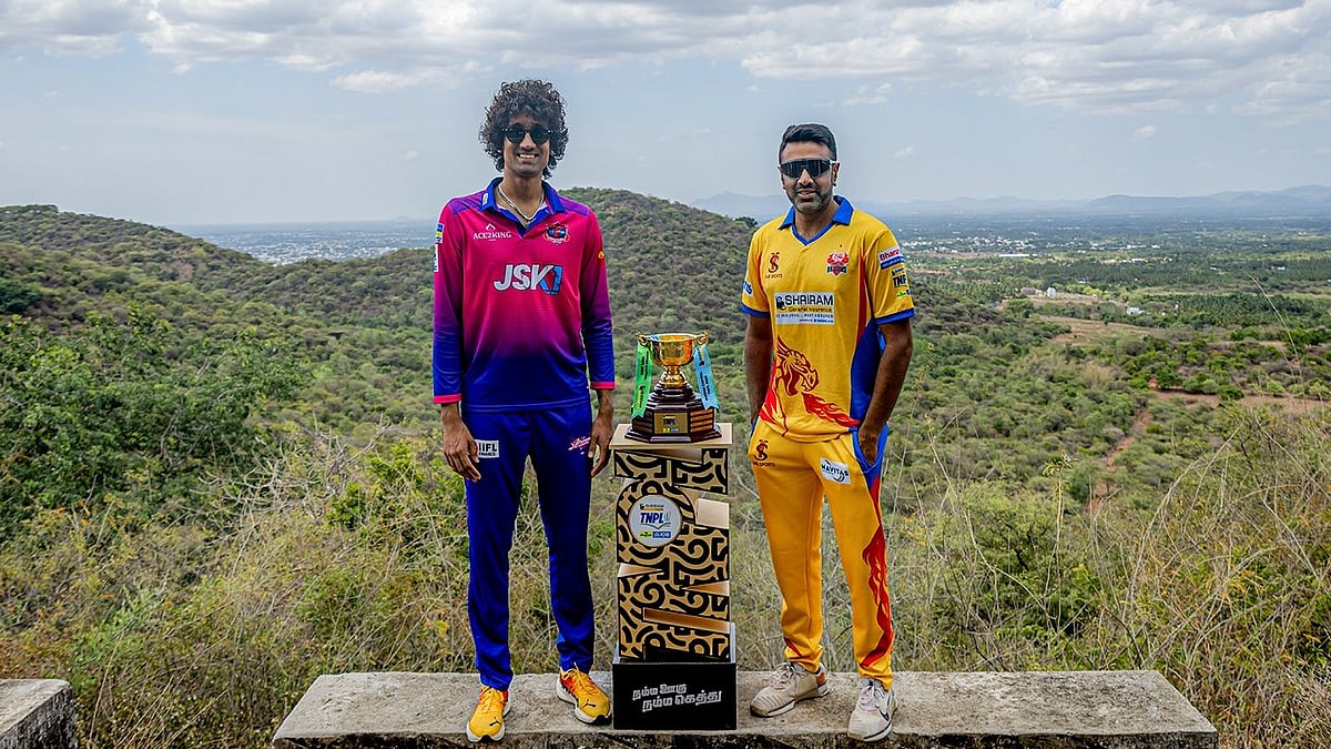 X/TNPremierLeague : Captains Sai Kishore (left) alongside R Ashwin posing with the trophy.