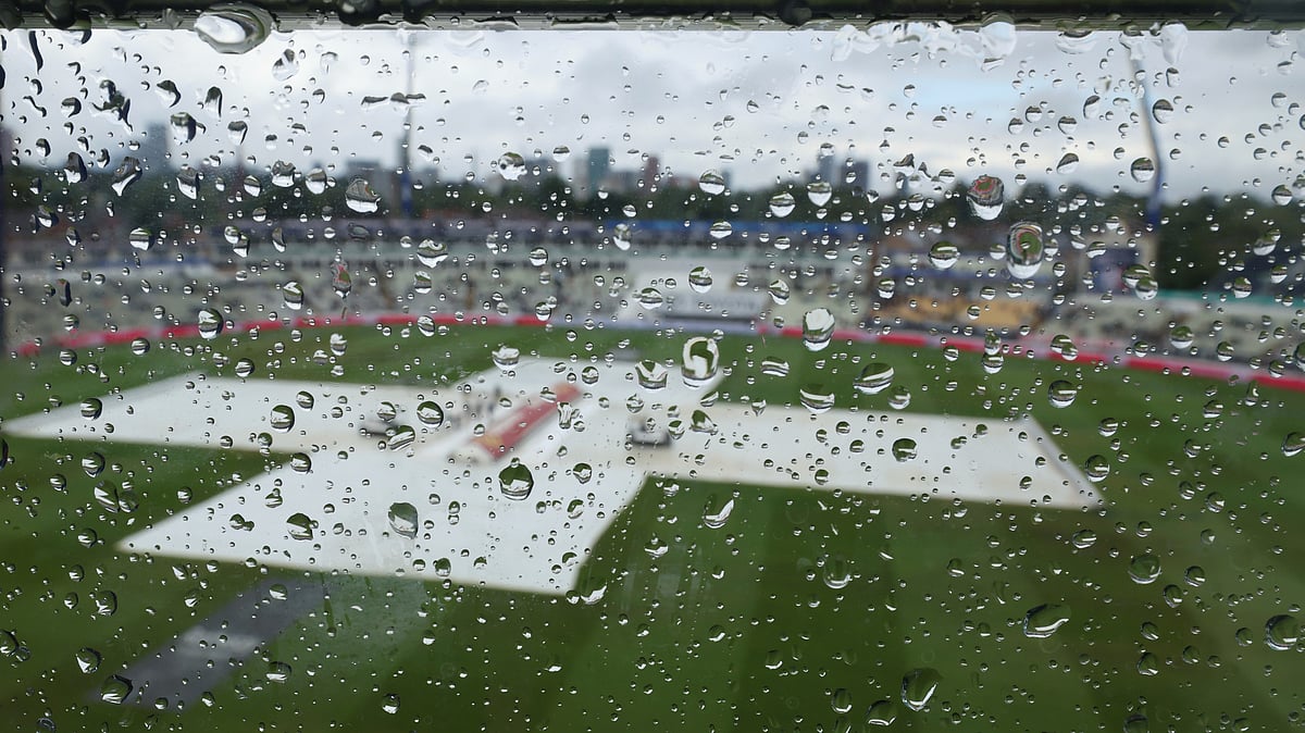 | Photo: AP/Scott Heppell : India Vs England 2nd Test Day 5: The covered pitch area is seen through glass speckled with droplets after rain delayed the start of play on day five of the second cricket test match between England and India at Edgbaston in Birmingham, England, Sunday, July 6, 2025.