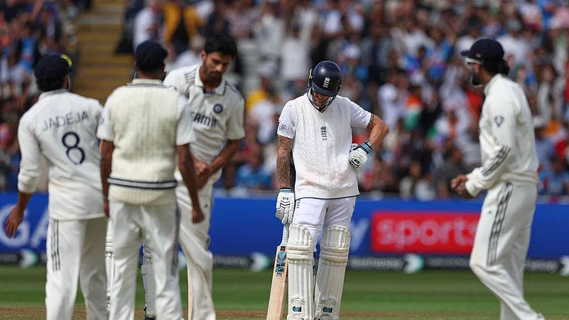 England captain Ben Stokes, second right, reacts after losing his wicket. AP