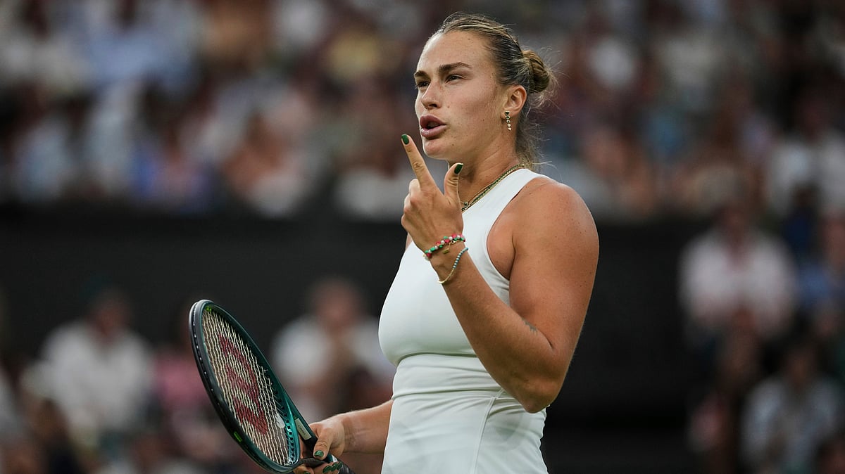 | Photo: AP/Kin Cheung : Aryna Sabalenka Vs Elise Mertens, Wimbledon 2025: Aryna Sabalenka of Belarus gestures as she plays against Emma Raducanu of Britain during a third round women's singles match at the Wimbledon Tennis Championships in London, Friday, July 4, 2025.