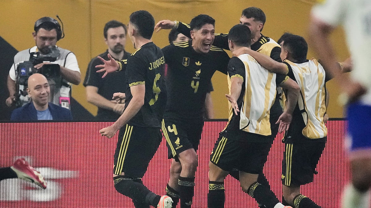 Mexico midfielder Edson Álvarez (4) celebrates with teammates. AP
