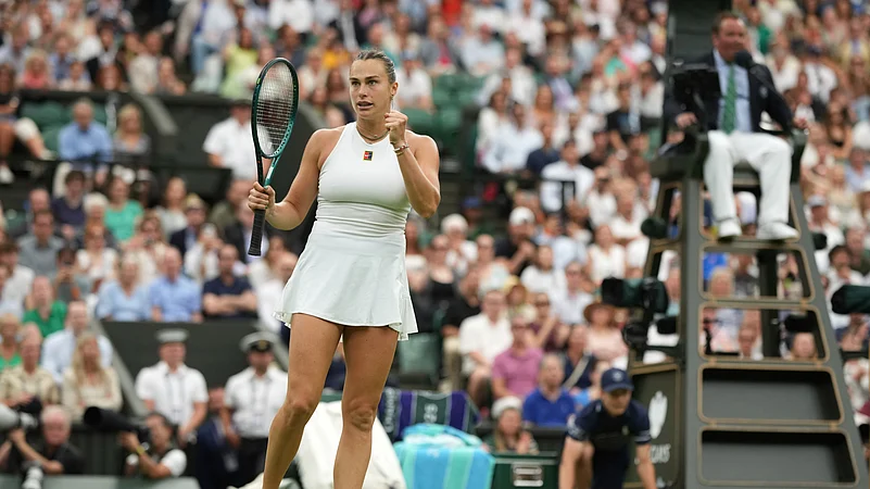 Aryna Sabalenka of Belarus celebrates after beating Belgiums Elise Mertens. AP