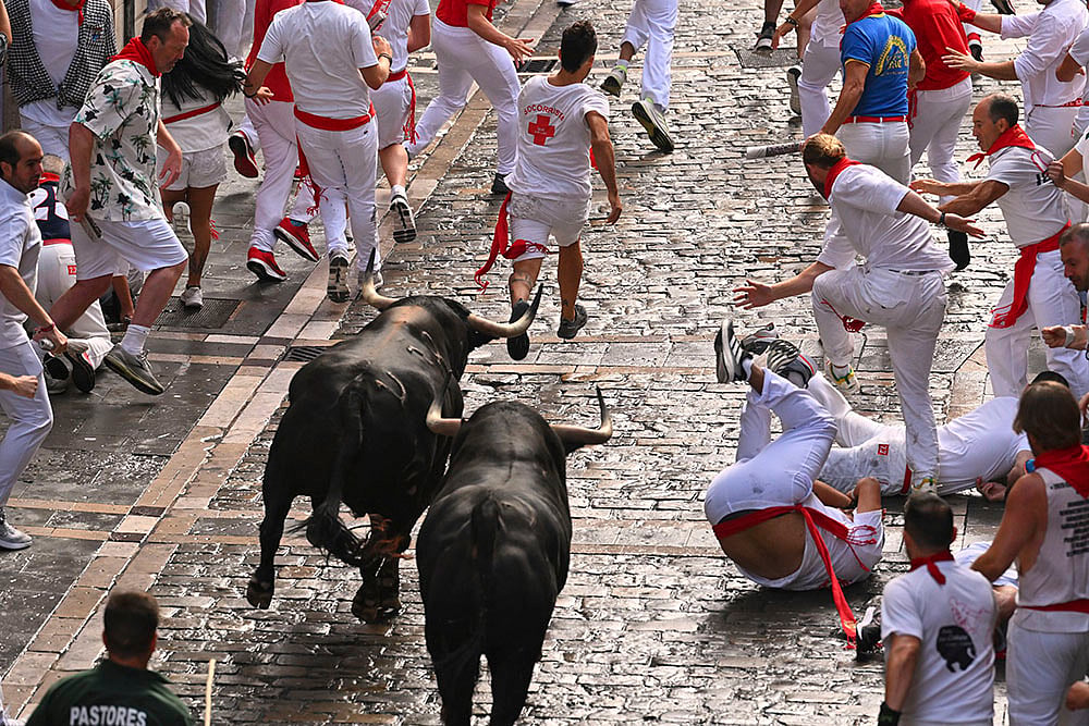 | Photo: AP/Miguel Oses : San Fermín Festival 2025