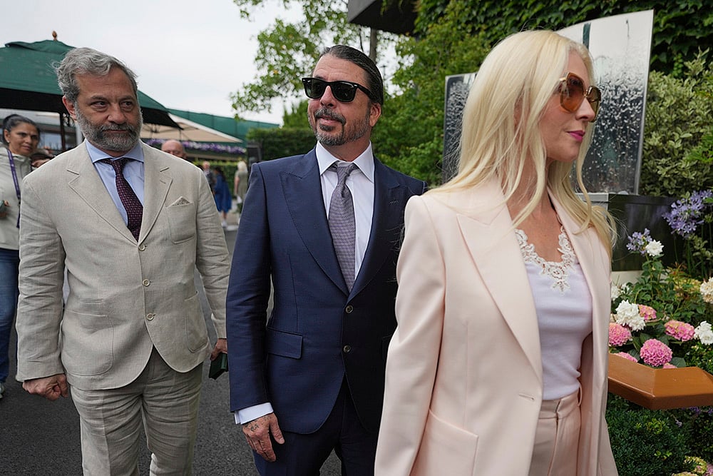 Celebrities attend 2025 Wimbledon Tennis in London_Musician Dave Grohl and his wife Jordyn