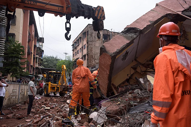 One Killed, 10 Injured In Homestay Wall Collapsed - Getty Image