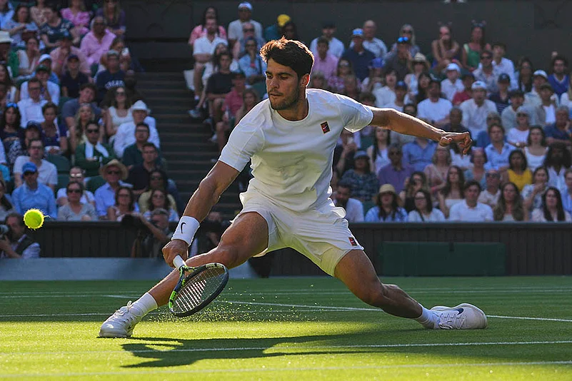 Britain tennis Wimbledon 2025 quarterfinal match Carlos Alcaraz Vs Cameron Norrie in London_1