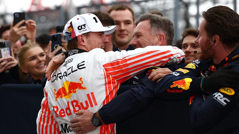 Max Verstappen and Christian Horner after Red Bull's win. - null