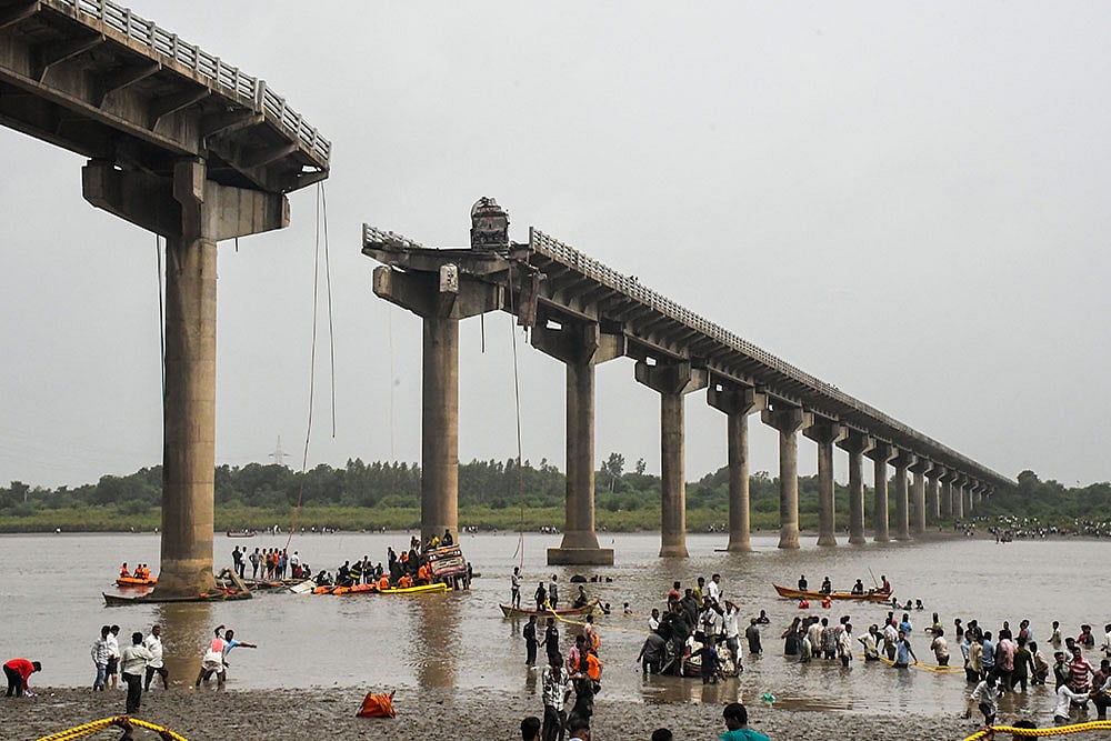 | Photo: PTI : Gujarat’s Vadodara Gambhira Bridge Collapse