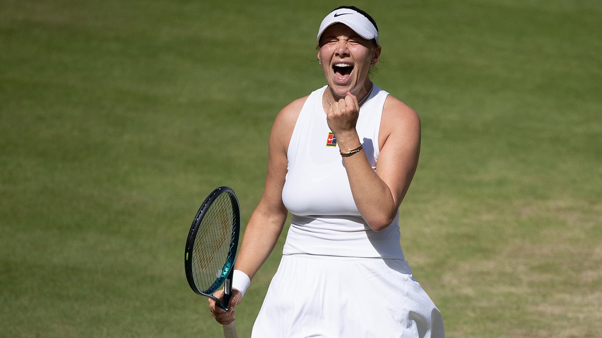 Amanda Anisimova celebrates after converting her fourth match point.