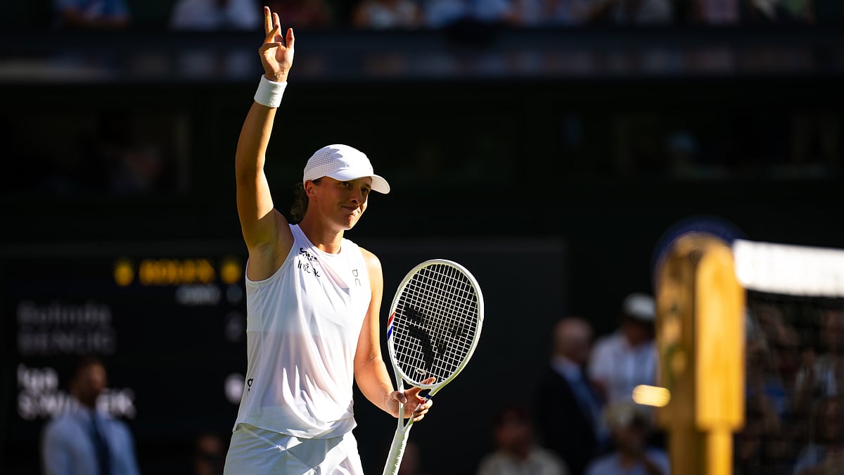 Iga Swiatek celebrates her victory over Belinda Bencic