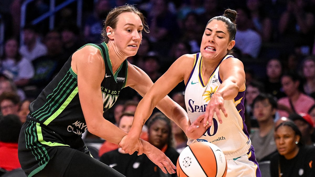 Los Angeles Sparks Kelsey Plum, #10, and Minnesota Lynx Alanna Smith, #8, go after a rebound during fourth quarter action at Crypto.com Arena on Thursday, July 10, 2025. The Lynx defeated the Sparks 91-82.