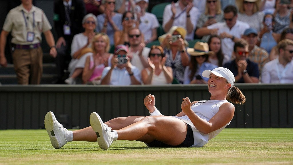Photo: AP : Iga Swiatek Vs Amanda Anisimova Highlights, Wimbledon 2025 Ladies Final: The former world number one celebrates after winning her maiden SW19 title.