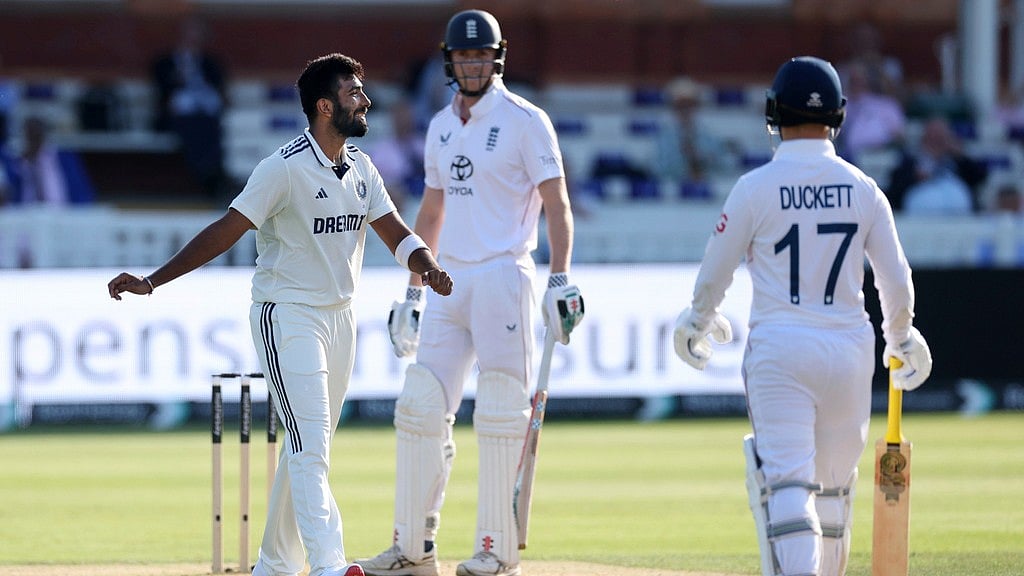 AP : India vs England 3rd Test: Jasprit Bumrah talks to teammates as Zak Crawley wastes time on Day 3 at Lord's. 