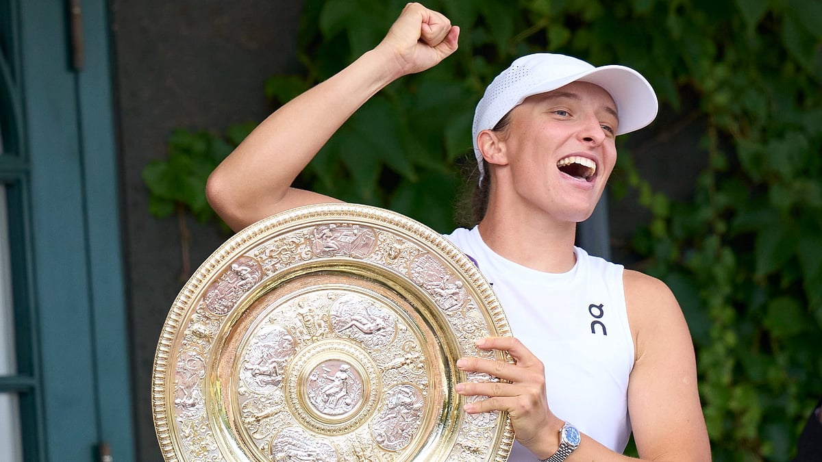 Iga Swiatek celebrates her first Wimbledon title - null