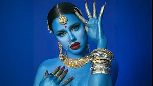 | Instagram | : Canadian rap artist Tommy Genesis with her skin painted in vivid blue