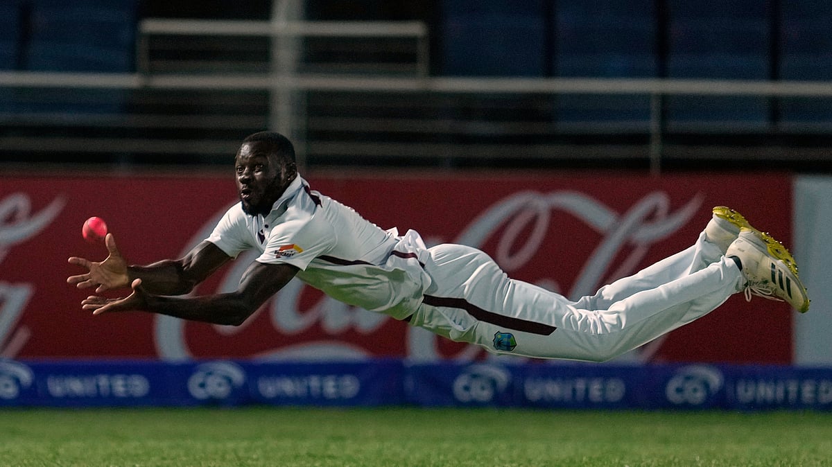West Indies' Anderson Phillip takes the catch to dismiss Australia's Travis Head on day one of the third Test cricket match at Sabina Park in Kingston, Jamaica. - AP Photo/Ricardo Mazalan