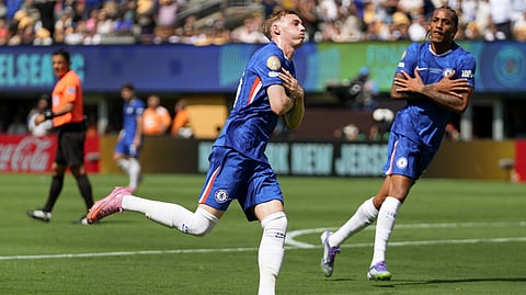 Chelsea's Cole Palmer, left, reacts after scoring a goal against Paris Saint-Germain during the first half of the Club World Cup final soccer match in East Rutherford, N.J., Sunday, July 13, 2025.