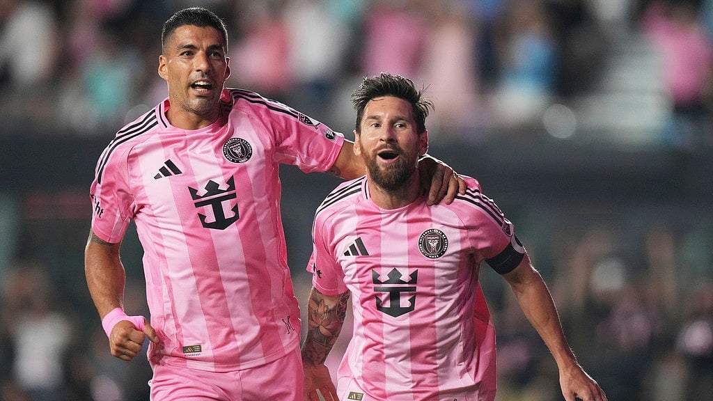 Inter Miami forward Lionel Messi, right, celebrates with Luis Suarez, left, after scoring a goal during the second half of an MLS soccer match against Nashville SC, Saturday, July 12, 2025, in Fort Lauderdale, Fla. - AP/Lynne Sladky