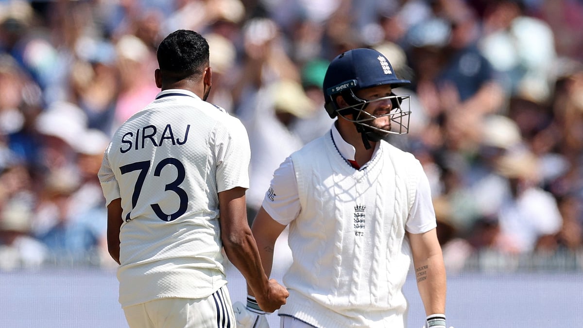 (AP Photo/Richard Pelham) : India's Mohammed Siraj, left, celebrates the dismissal of England's Ben Duckett, right, during the fourth day of the third cricket test match between England and India at Lord's cricket ground in London, Sunday, July 13, 2025.