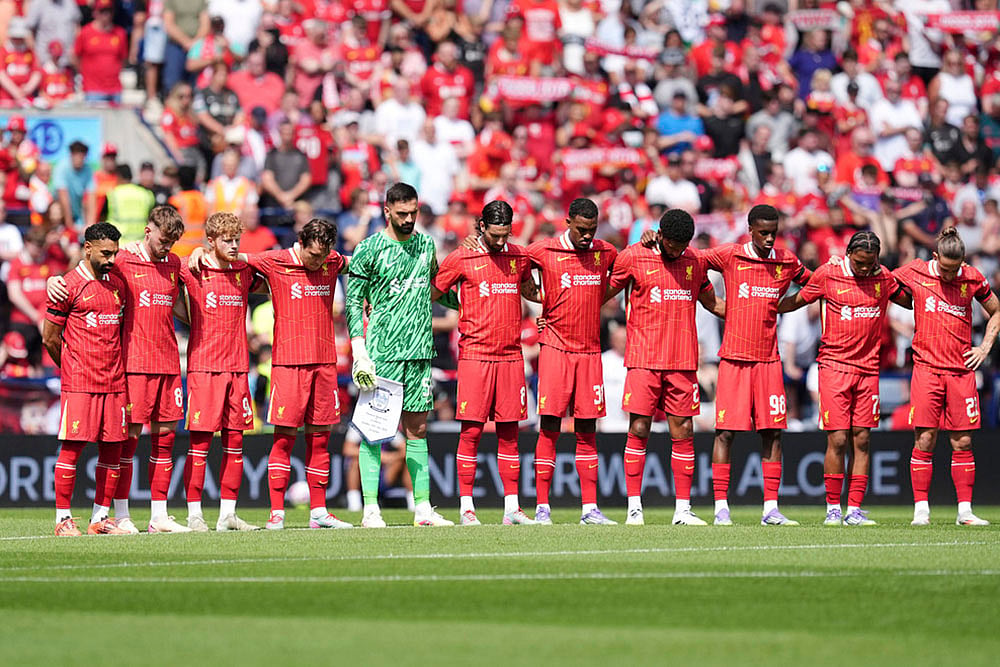 | Photo: Martin Rickett/PA via AP : Pre-season Friendly Soccer: Preston vs Liverpool