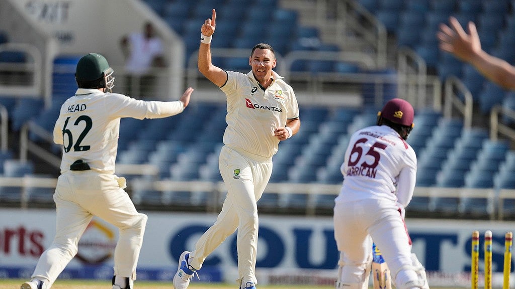 AP/Ricardo Mazalan : Australia's Scott Boland celebrates after taking the wicket of West Indies' Jomel Warrican to complete a hat trick on day three of the third Test match at Sabina Park in Kingston, Jamaica, Monday