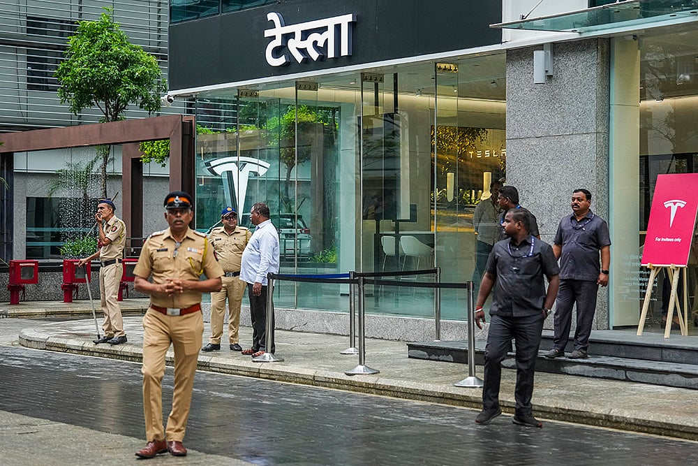 | Photo: PTI/Shashank Parade : Tesla makes India debut with 1st store in Mumbai